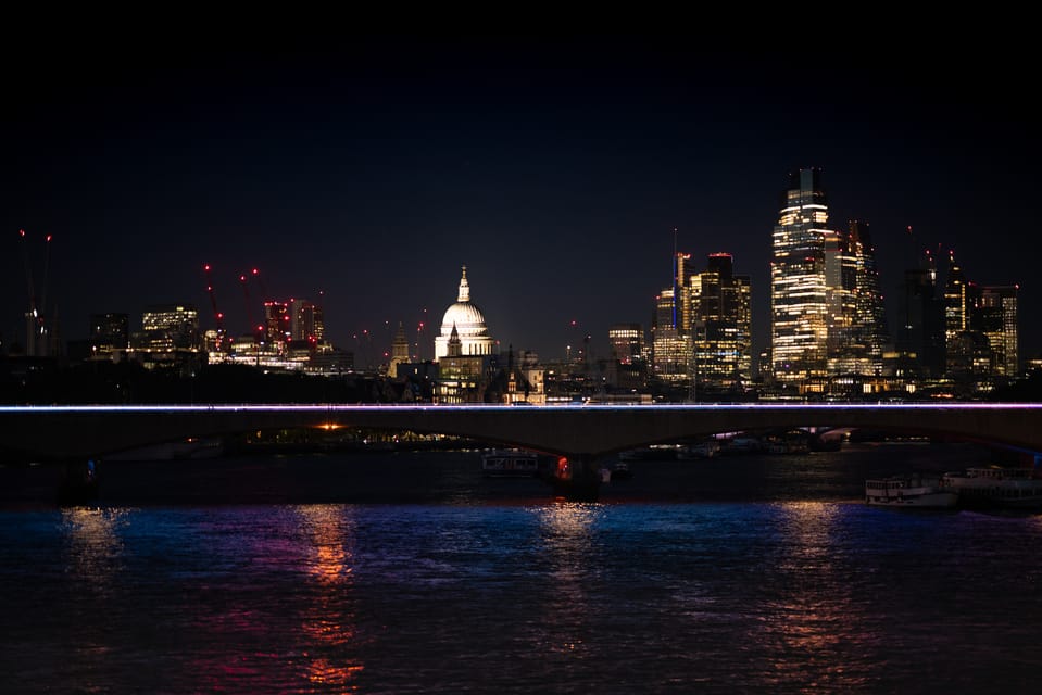 London skyline at night from the Thames